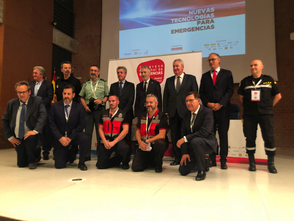 Marlaska posa con autoridades y ponentes en el Primer Congreso Nacional de Emergencias