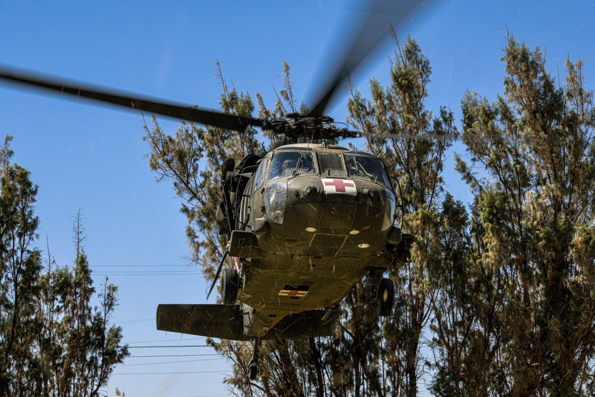 Helicu00f3ptero Sikorsky UH 60L Black Hawk empleado por el US Army en el entrenamiento de evacuaciones aeromu00e9dicas en SF24 Firma Eju00e9rcito de Chile